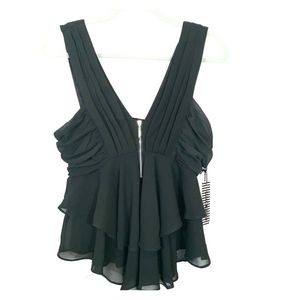 Woman's forest green sleeveless ruffle blouse size medium